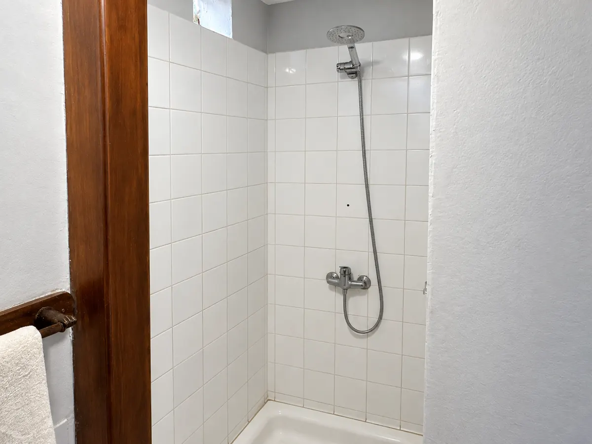 The tiled walk-in shower.